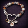 Mixed multi charm stretch heart bracelet