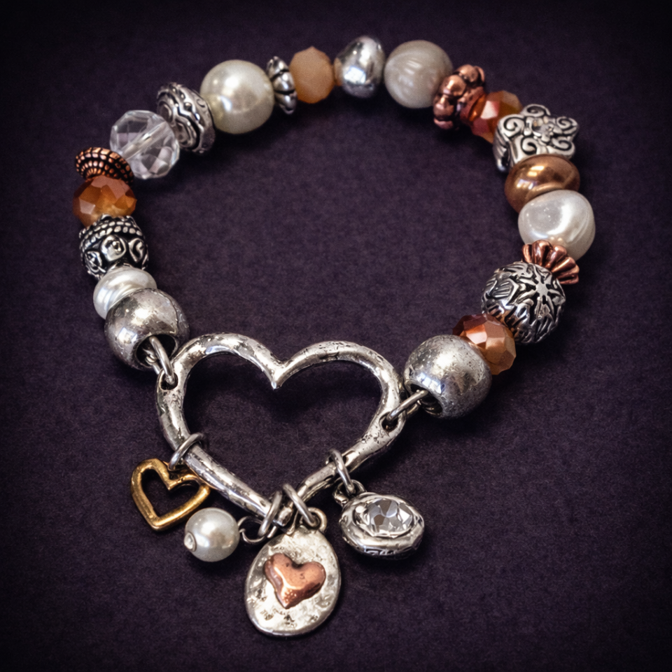 Mixed multi charm stretch heart bracelet