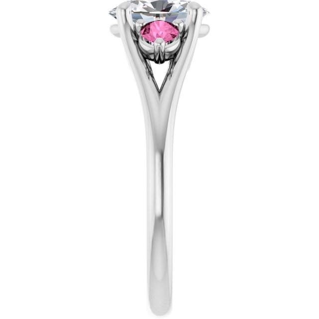 oval moissanite ring in silver with accent pink sapphires