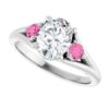 oval moissanite ring in silver with accent pink sapphires